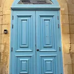 Traditional Townhouse On The Main Street In Valletta Blue Door