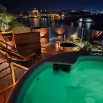 Unique Seafront Triplex Penthouse With Panoramic Bedroom & Rooftop Jacuzzi Overlooking Valletta